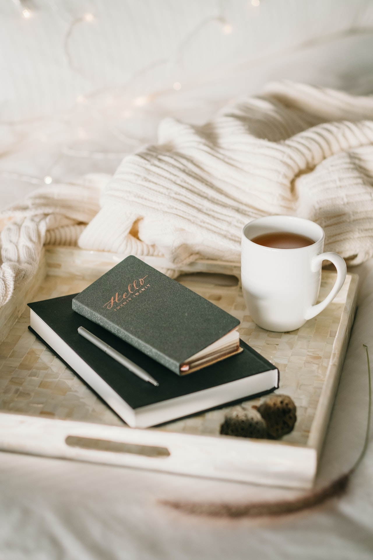 photo-of-cup-beside-books-4068029
